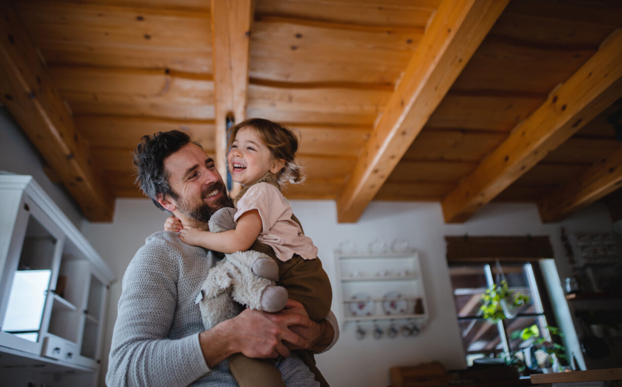 Man hugging a child